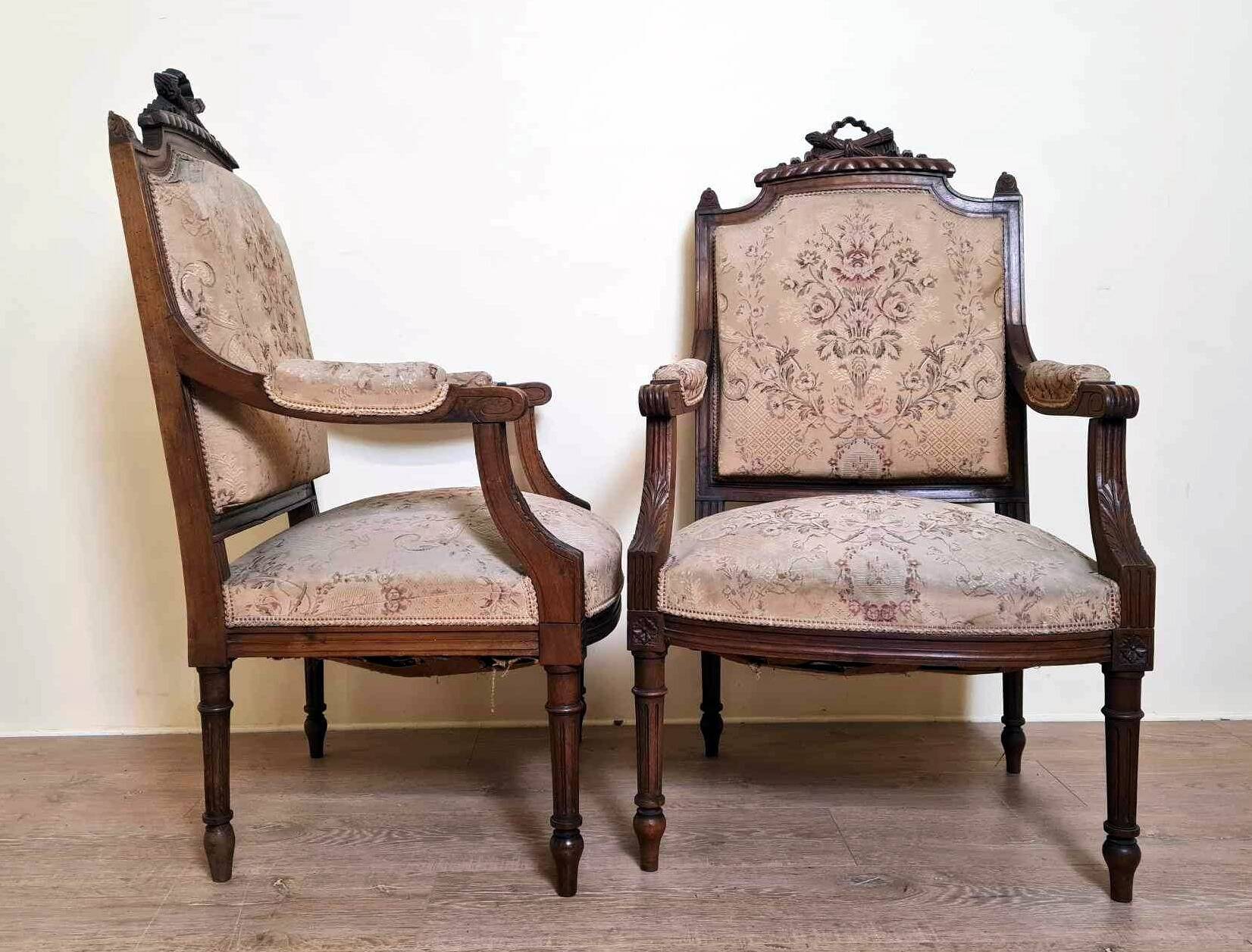 Pair of Louis XVI style queen-style armchairs in richly carved wood