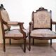 Pair of Louis XVI style queen-style armchairs in richly carved wood