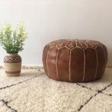 Moroccan-style brown leather pouf