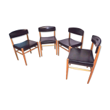 Four Scandinavian-style chairs