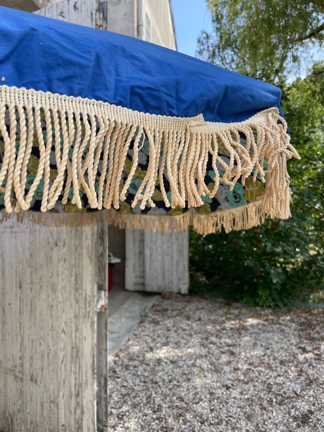Blue parasol and flowers