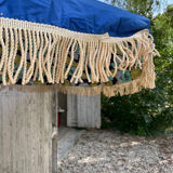 Blue parasol and flowers