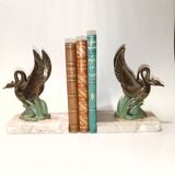 Art Deco bookends with metal swans, double patina and marble base.