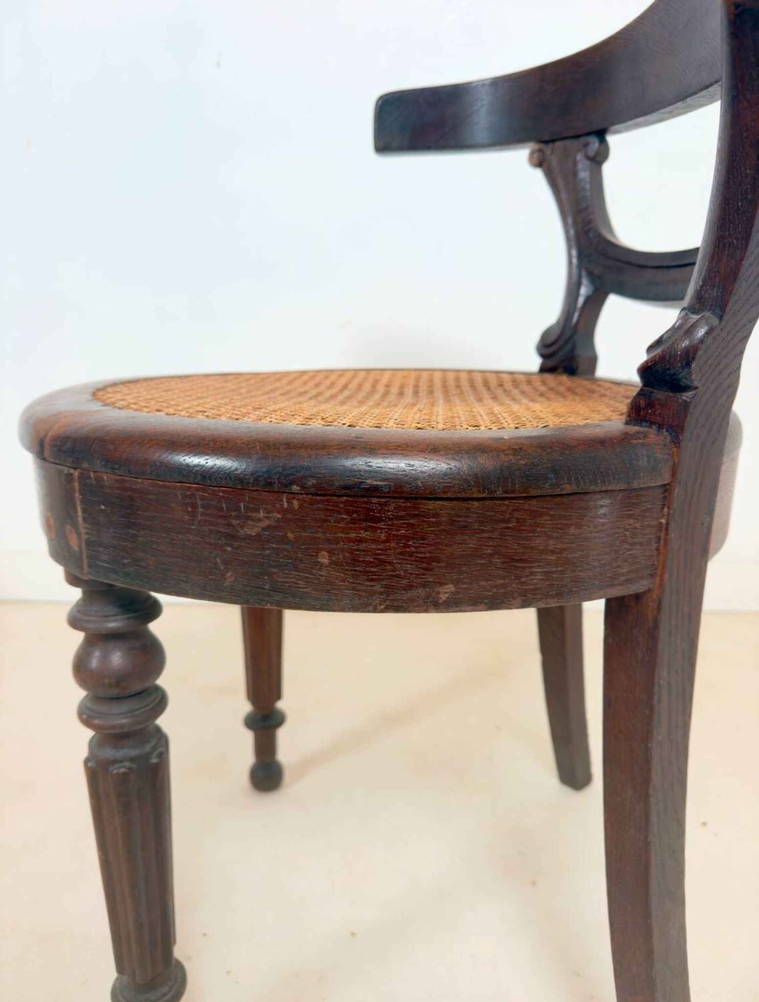 Antique Louis Philippe style chair in wood and caning.