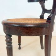 Antique Louis Philippe style chair in wood and caning.