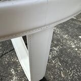 Round coffee table with a metal/leather frame and glass top by Roche Bobois.