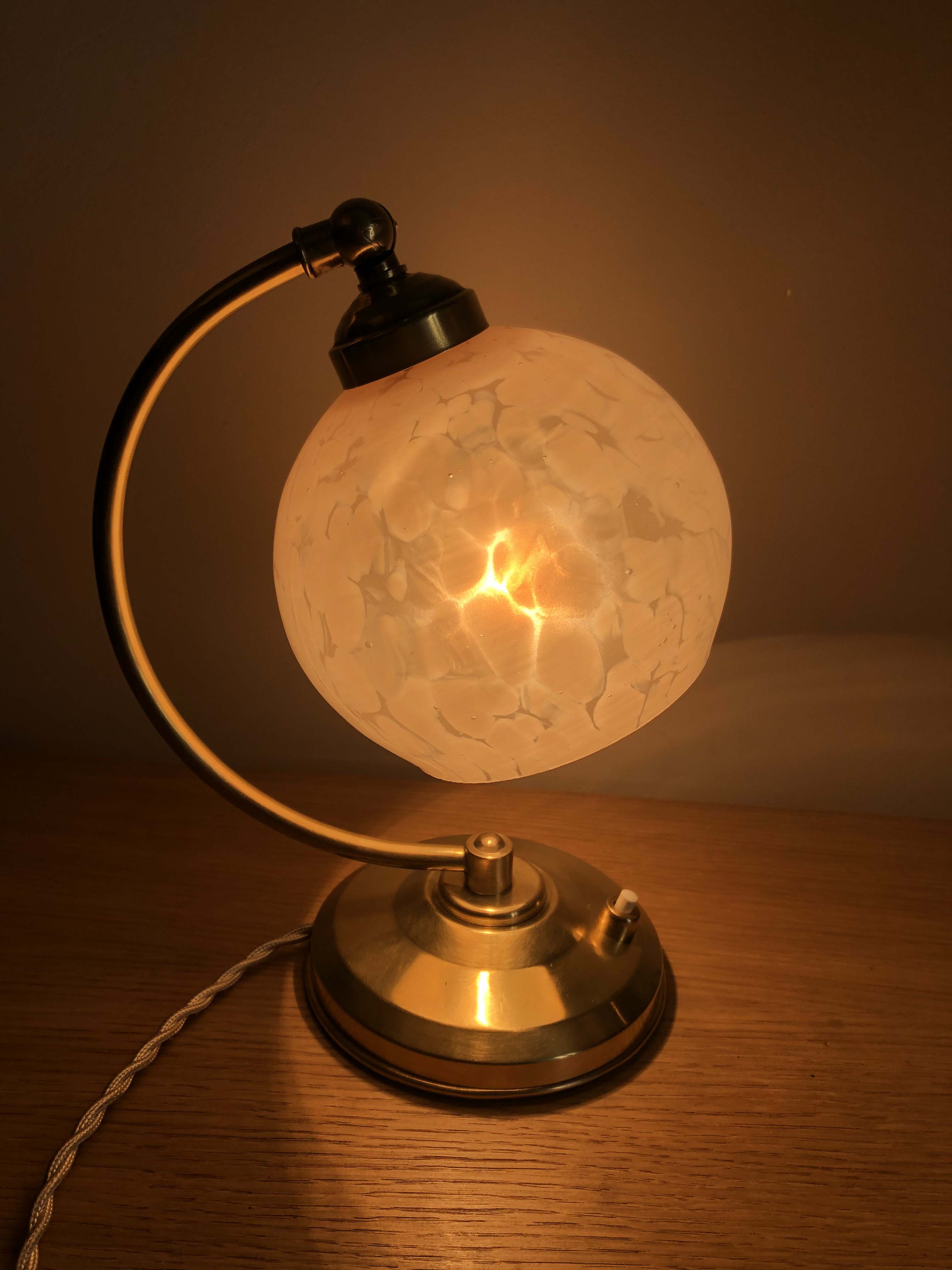 Old articulated bedside lamp