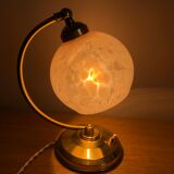 Old articulated bedside lamp