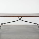 Antique 18th-century Spanish dining table with a wrought iron base