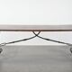 Antique 18th-century Spanish dining table with a wrought iron base