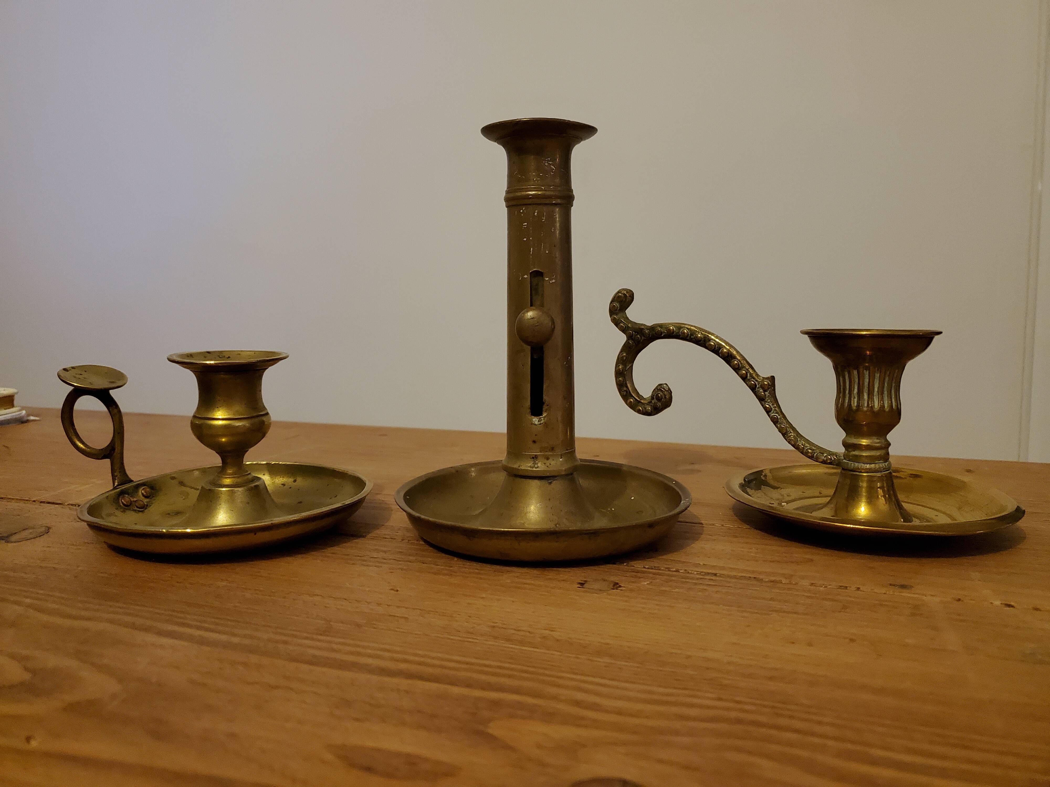 Set of brass candle holders