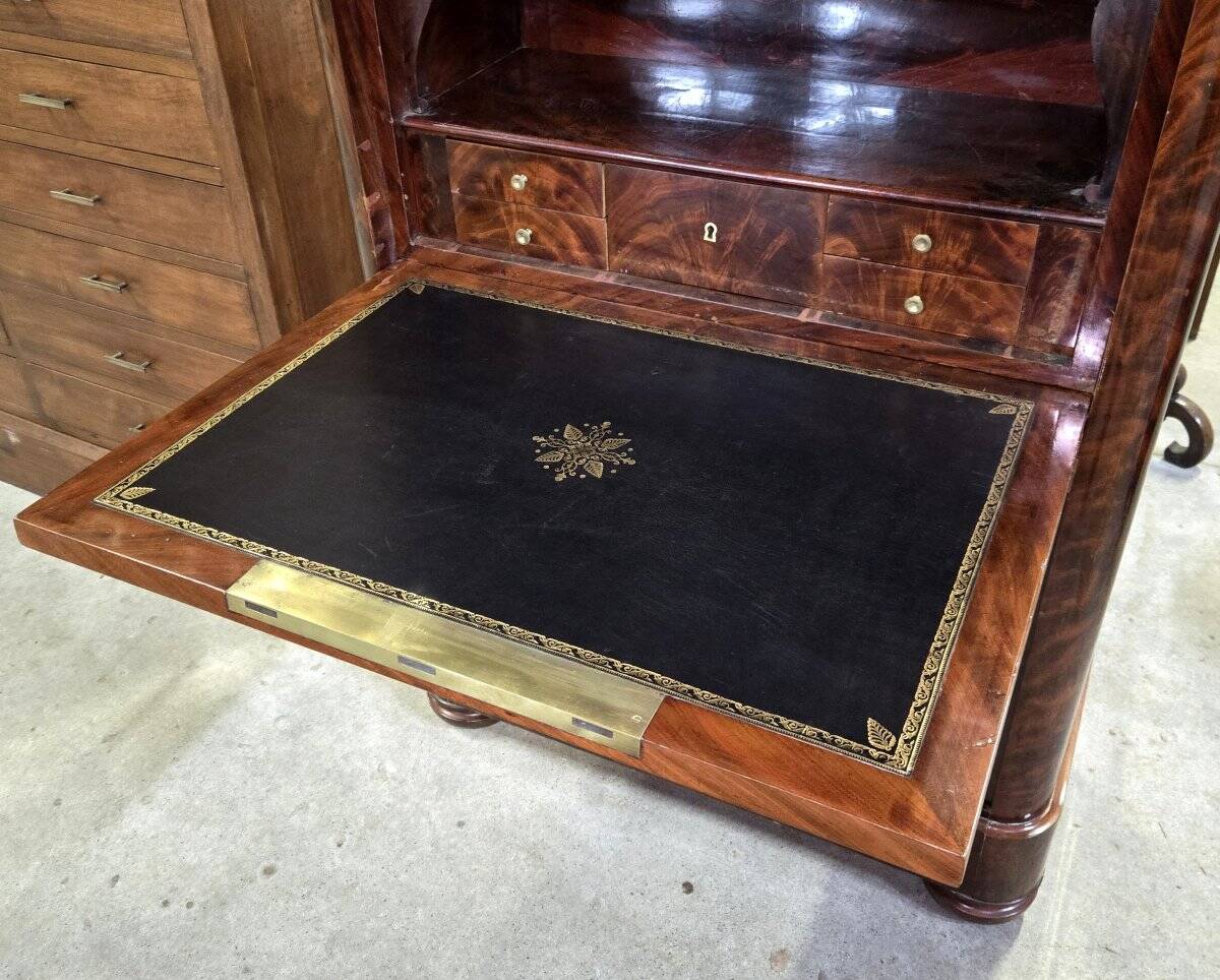 Flamed mahogany secretary from the Restoration period.