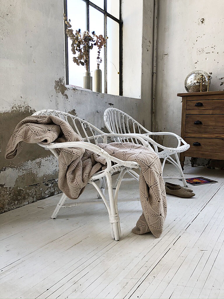 Pair of white rotin armchairs