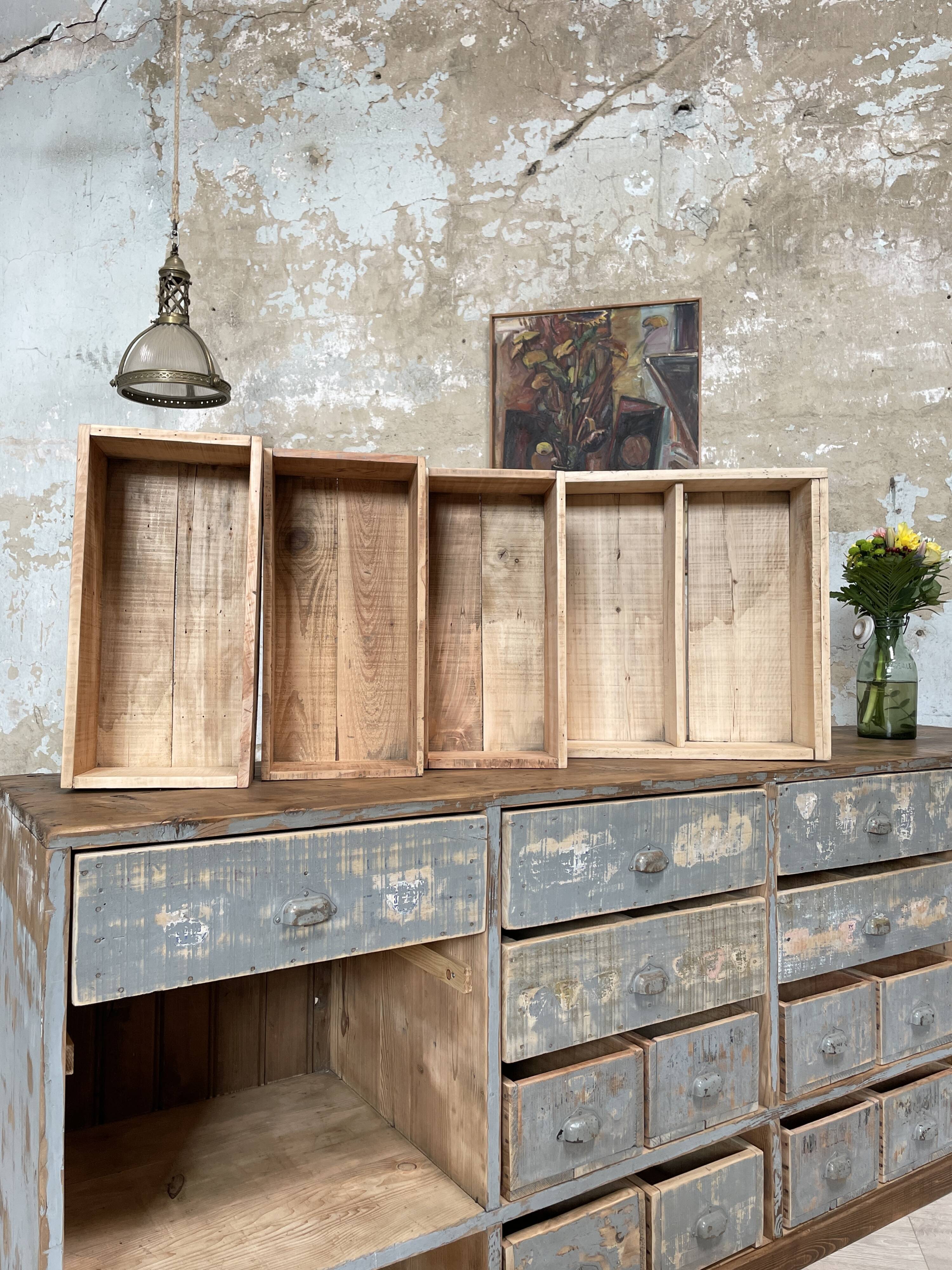 Artisanal workshop bank in patinated wood, circa 1950.