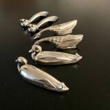 6 different animal knife holders, made of metal