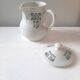 Vintage cream pot with Art Deco pattern and its lid.
