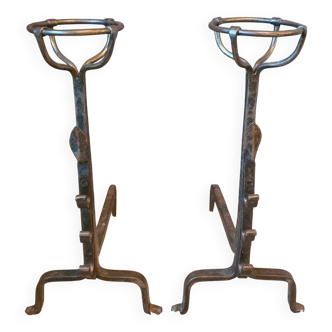 Pair of fire dogs, bucket andirons from the 19th century.