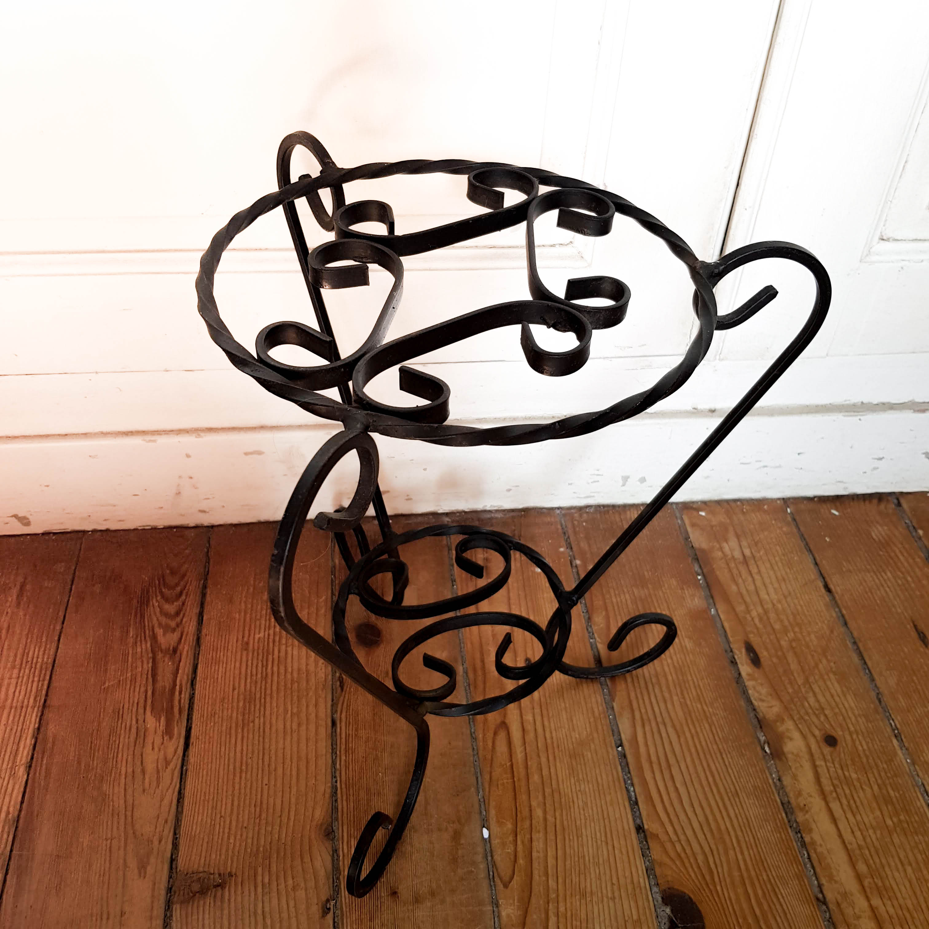 Wrought iron plant holder