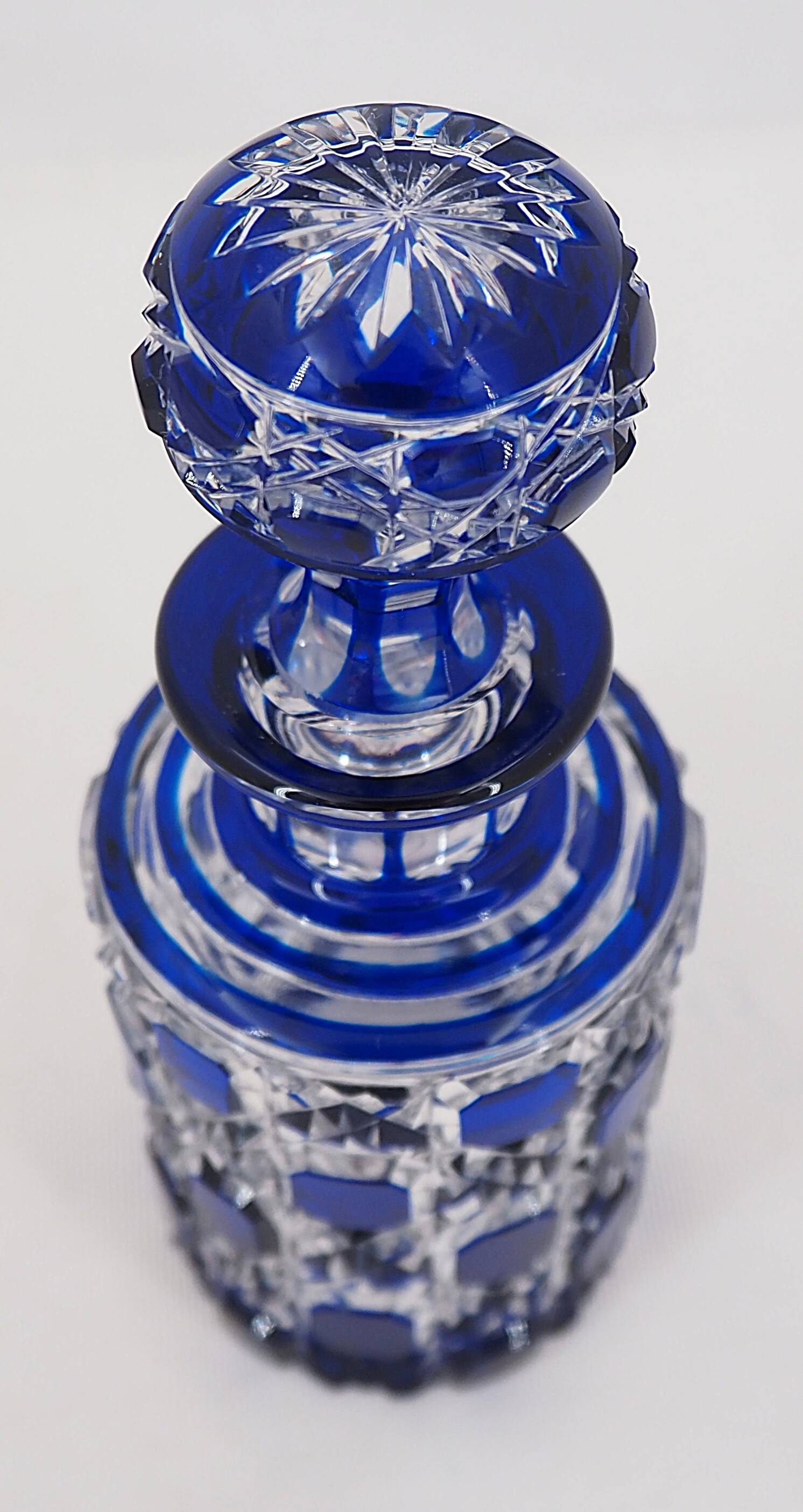Baccarat, cut crystal bottle, blue lined, diamond gemstones, 14.8 cm.