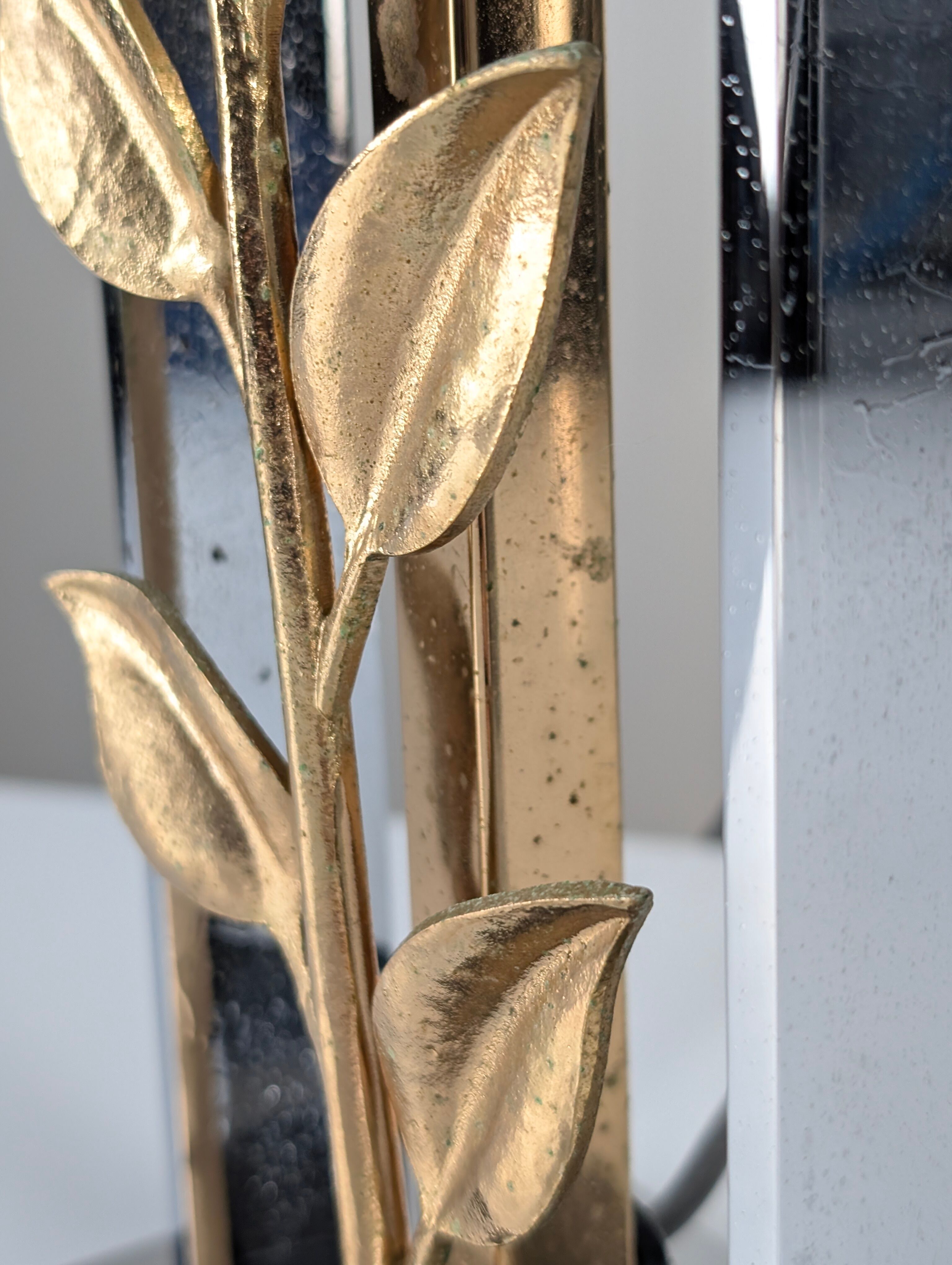 Maison Charles table lamp in chrome and gilt bronze with rose, France, 1970s