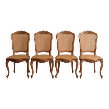 Set of 4 Regency chairs in caned cherry wood.
