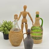 Trio bottles / lady Jeanne, dressed in wicker, rattan, natural fibers