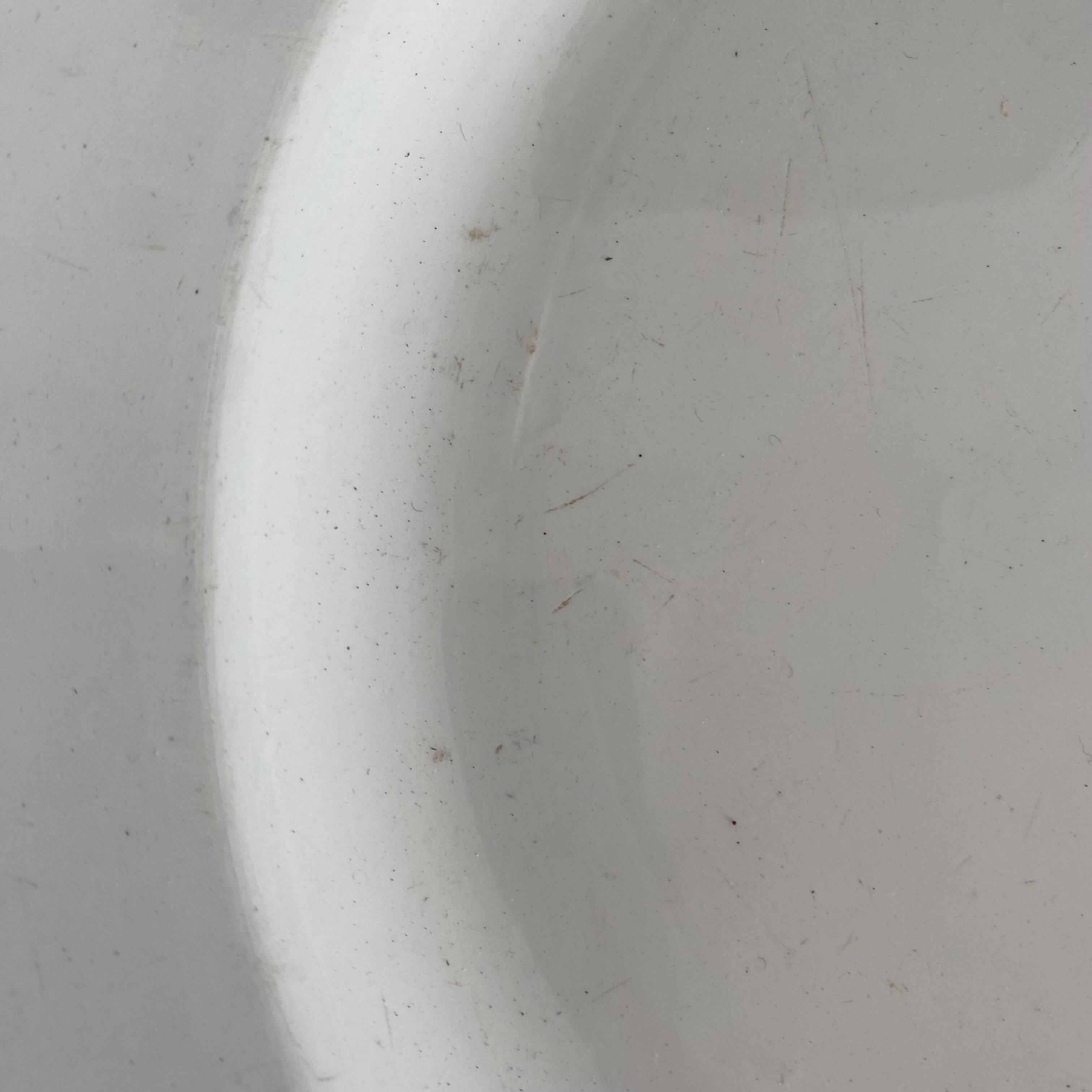 Set of large round white earthenware dishes from Creil and Montereau, 19th century