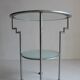 Postmodern round glass  and steel side table, 1980s.