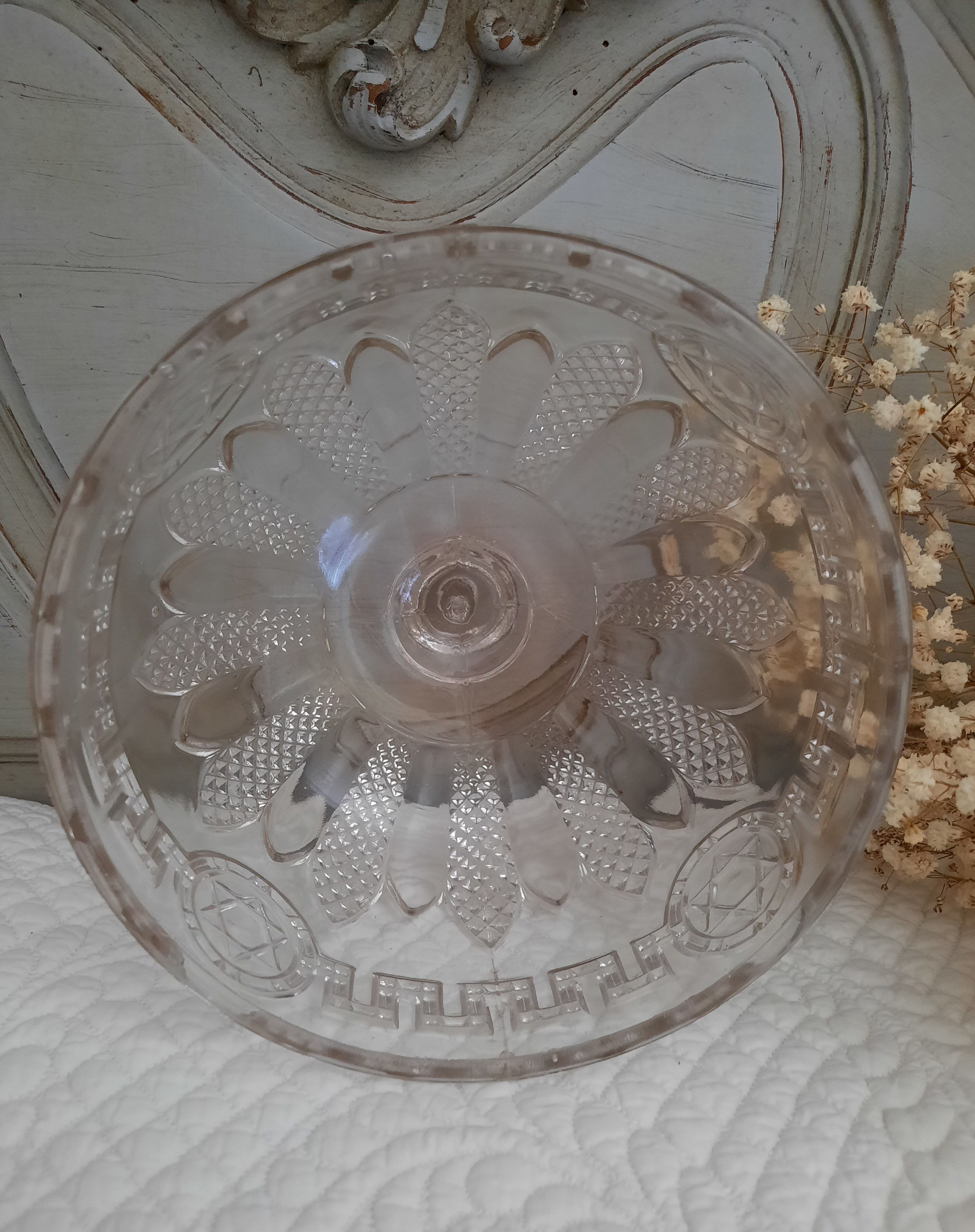 Chiseled glass bell on its dish