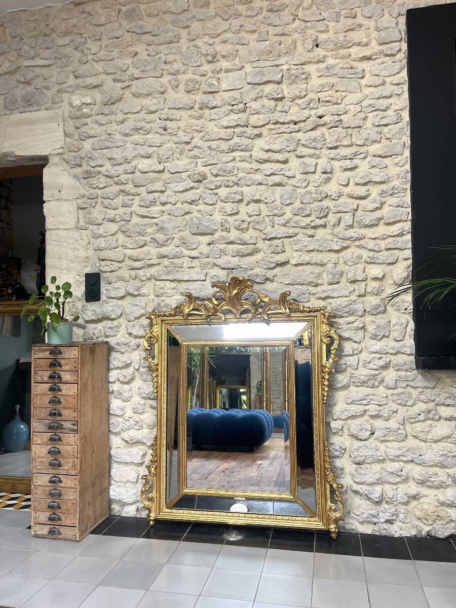 Antique mirror with a frame 123/100cm with gilded pediments, eagle heads, antique.