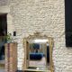 Antique mirror with a frame 123/100cm with gilded pediments, eagle heads, antique.