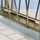 Neoclassical brass magazine rack attributed to Maison Ramsay.