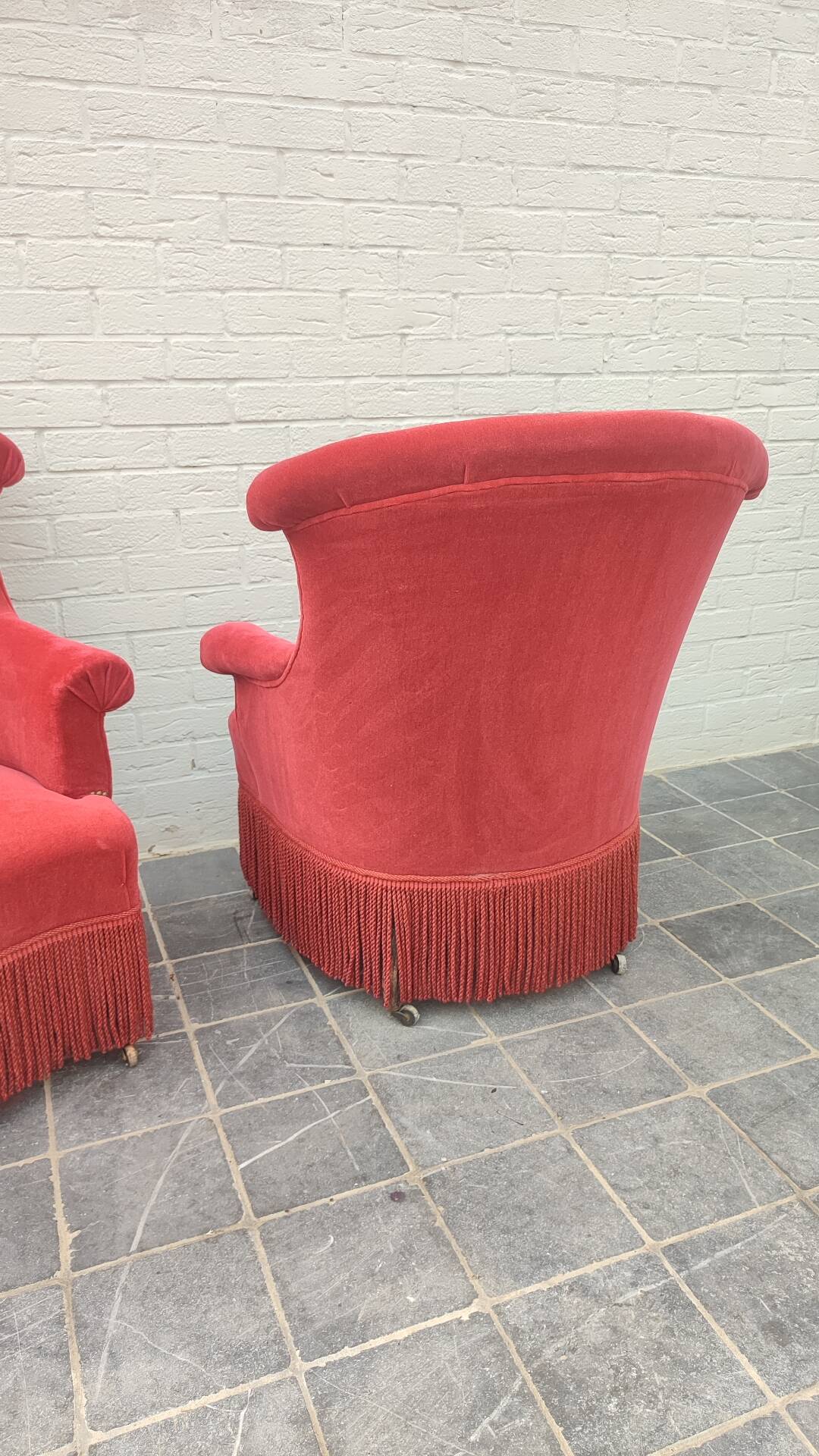 Pair of fringed crapaud armchairs