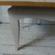 Vintage coffee table patinated pearl gray waxed finish, top against glued varnished oak