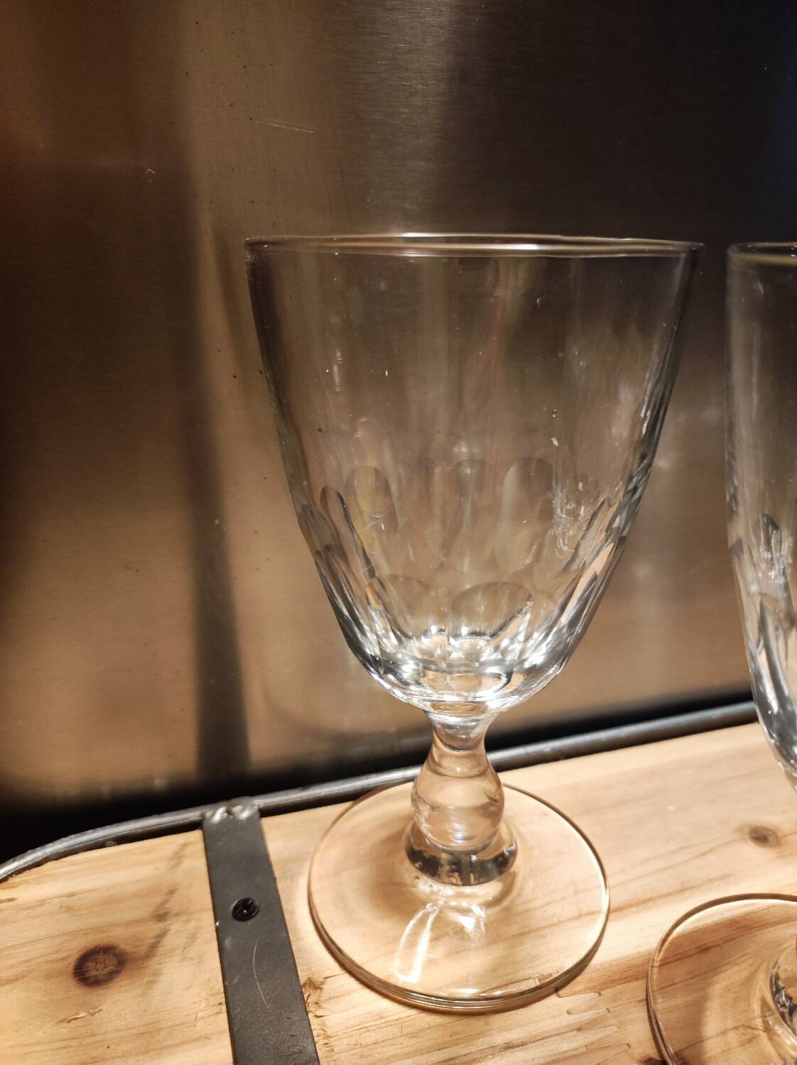 5 antique wine glasses with cut sides