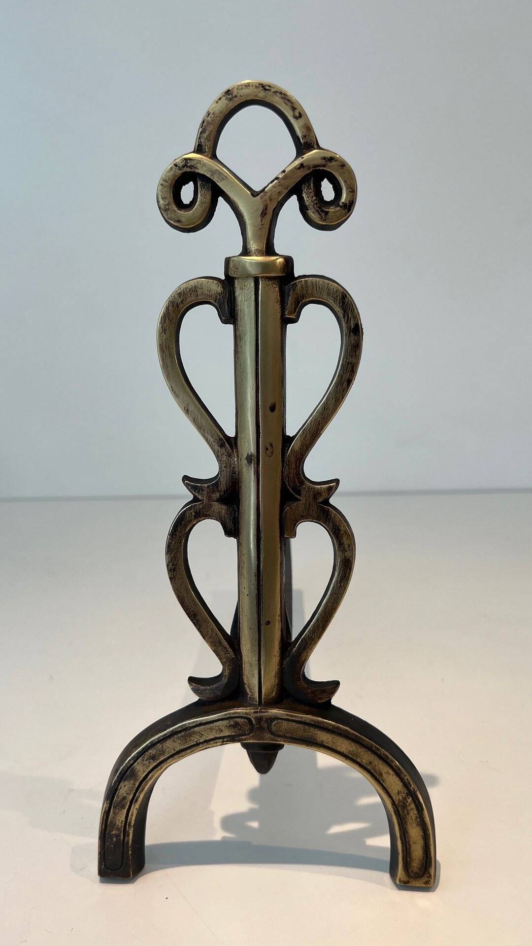 Pair of Brass and Wrought Iron Chenets with Triple Volute and Mount Torch Holders