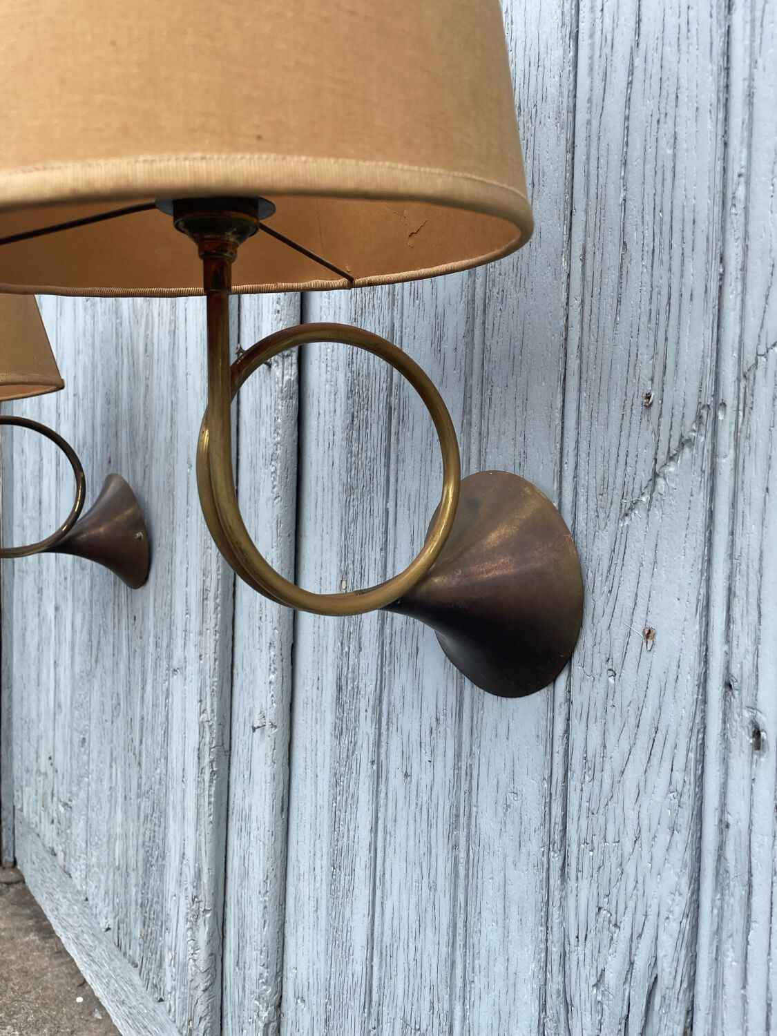 Two cornet-shaped wall lights