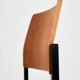 Teak chair on metal base