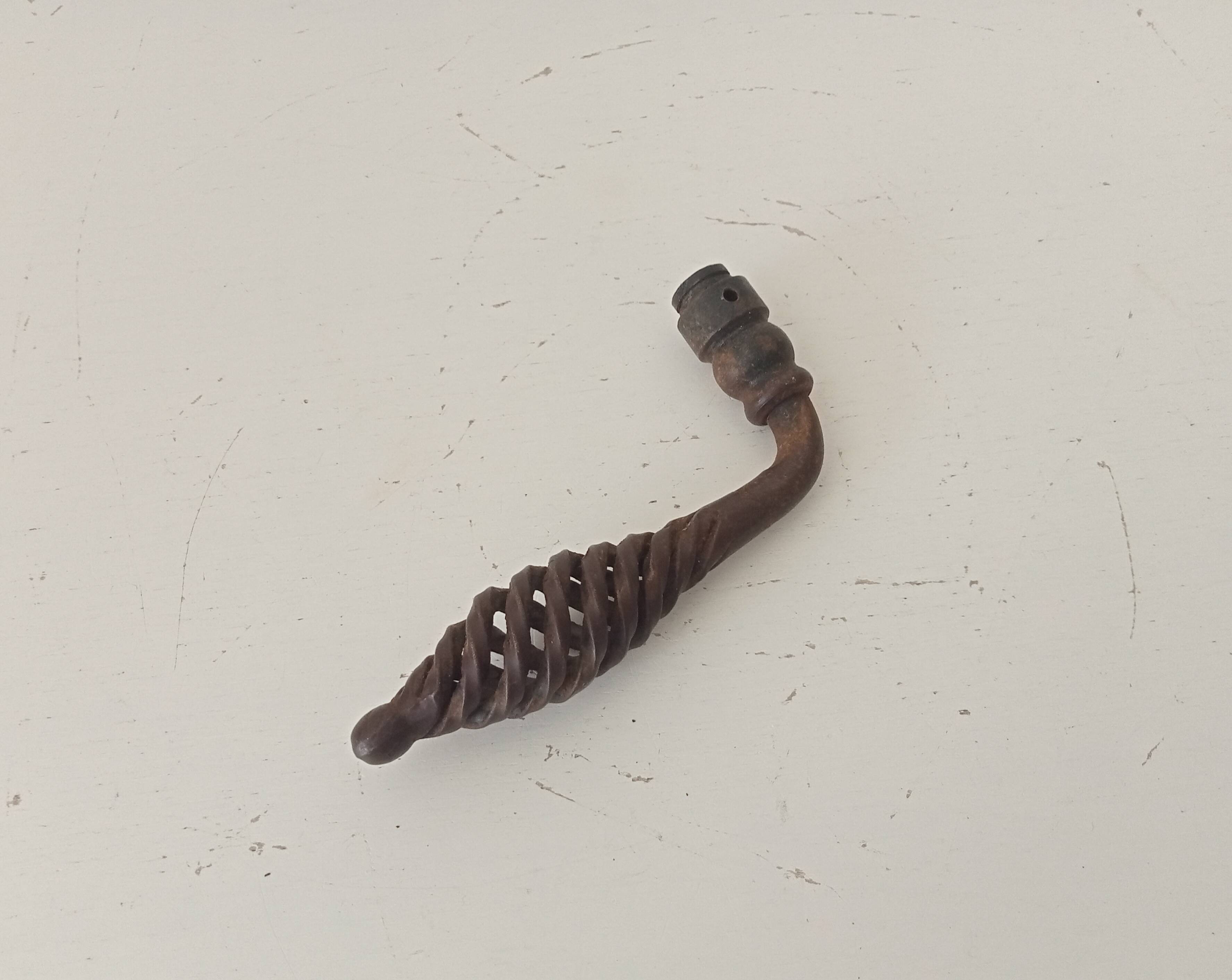 Twisted door handle in solid wrought iron, antique.