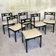 6 black lacquered wooden chairs