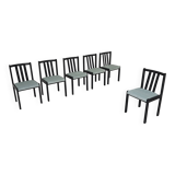 Set of 6 modernist black chairs with light blue-green ribbed fabric.