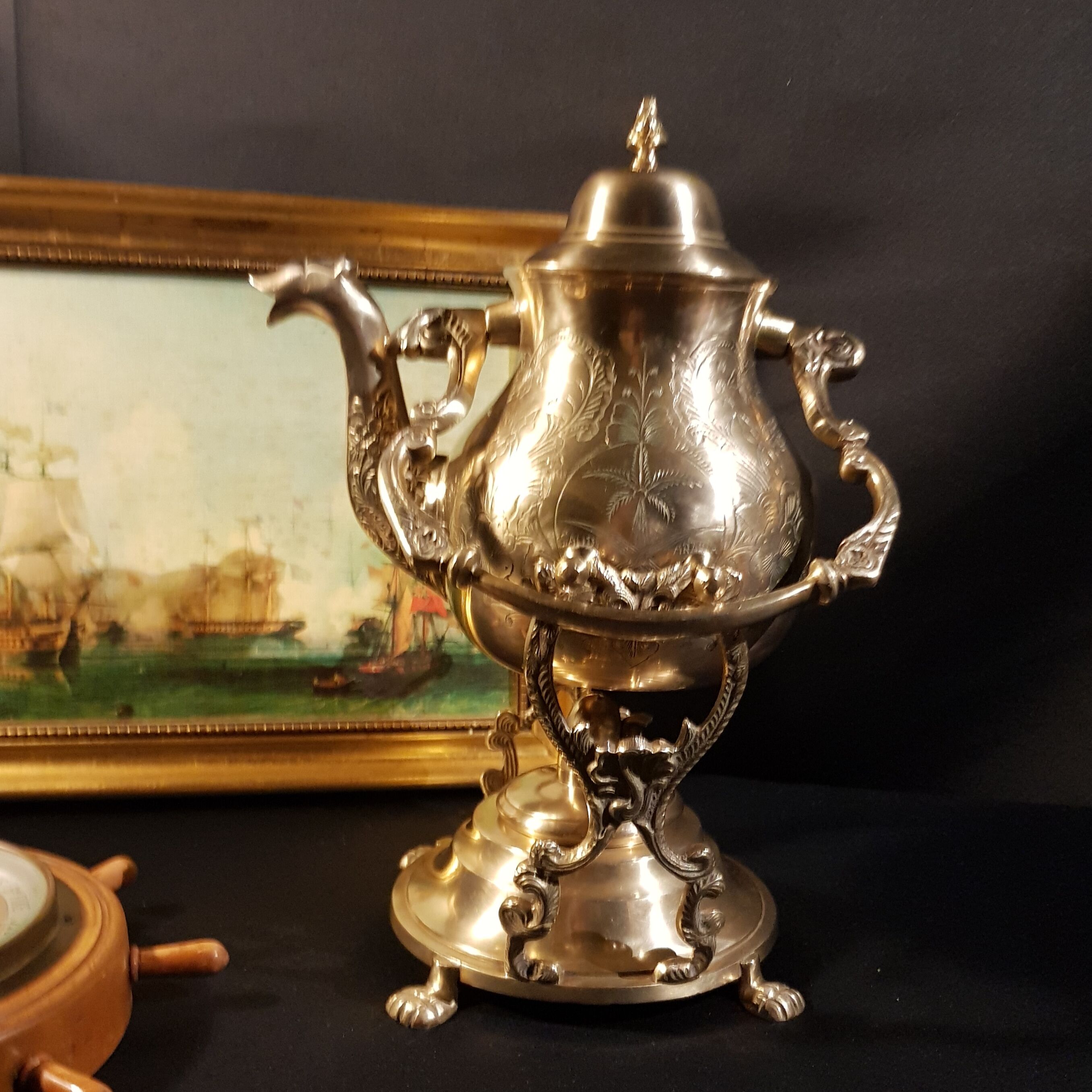 Oriental teapot on its support