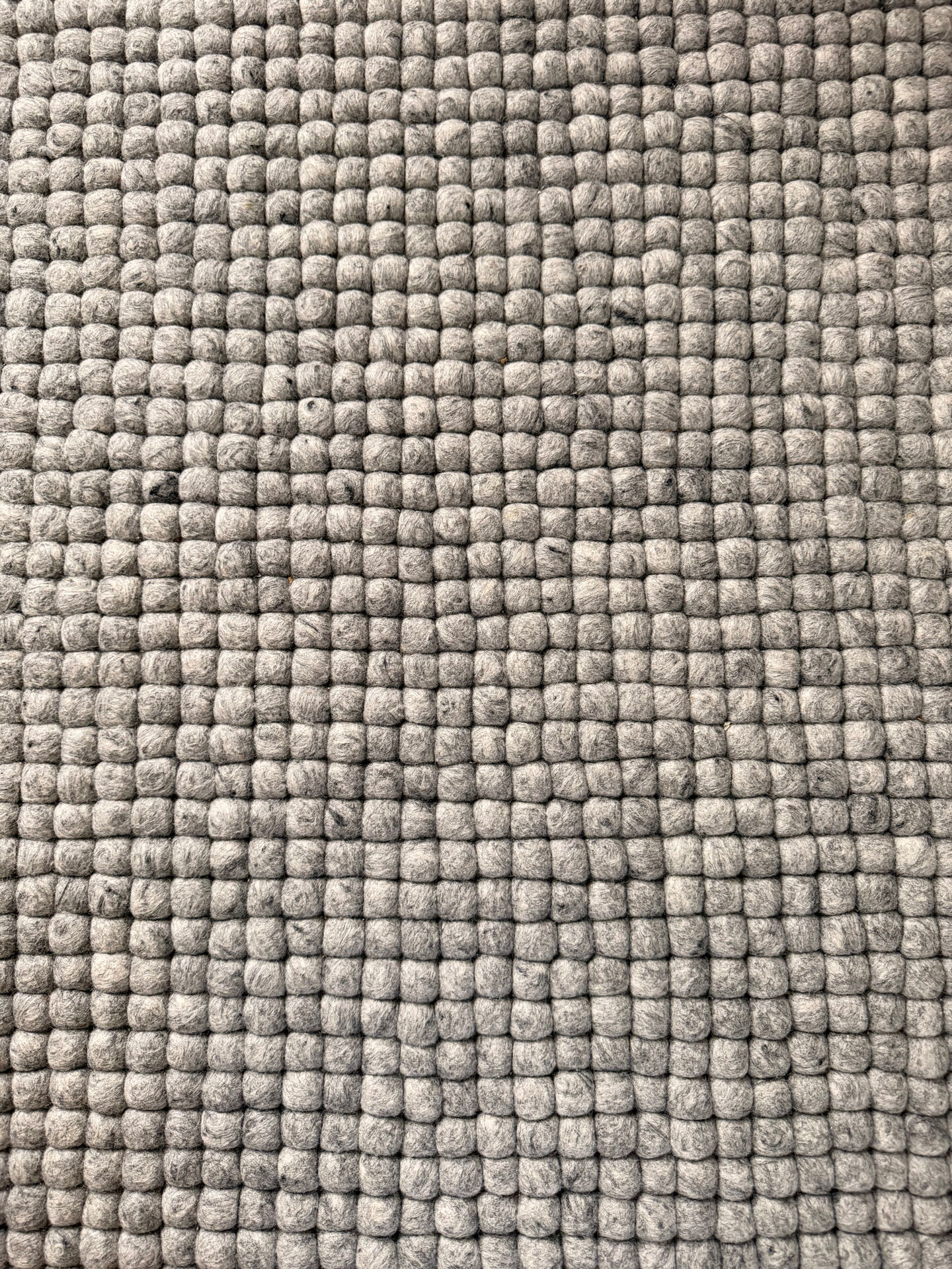 Myfelt rug made of virgin wool felt balls.