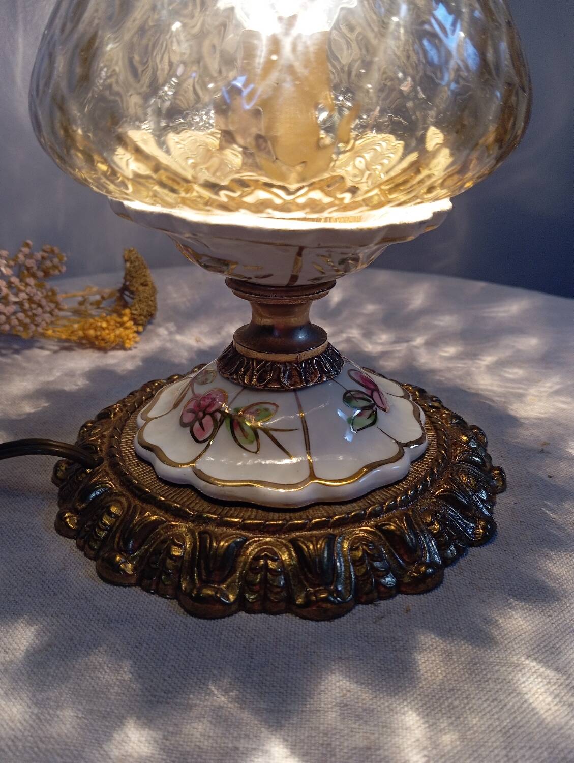 Baroque inspired table lamp, bronze, ceramic flowers and glass globe
