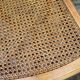 Vintage caned Louis XVI chair in solid gold wood.