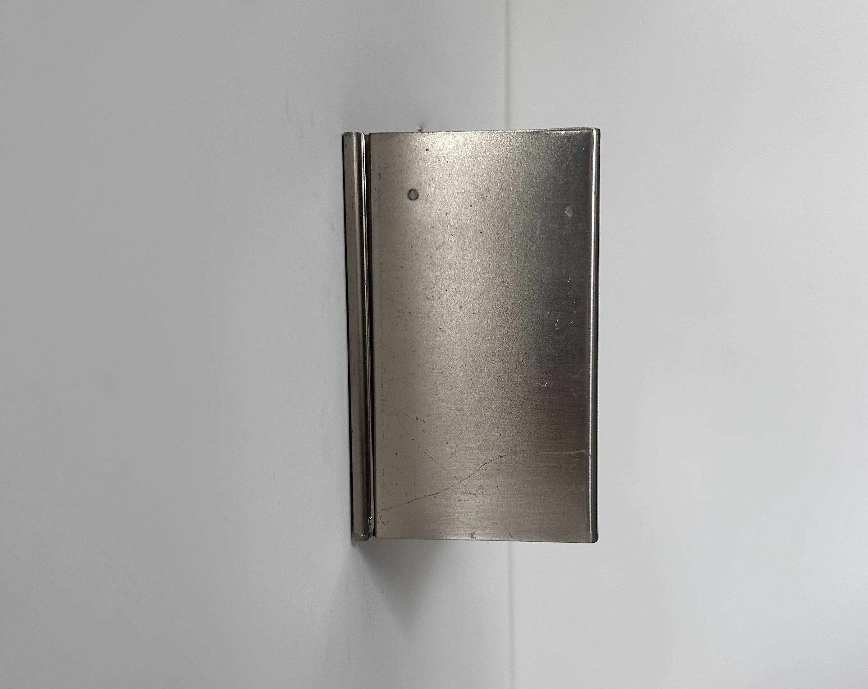 Vintage modernist wall lamp, folded metal, France 1970