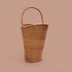 Old woven wicker umbrella stand