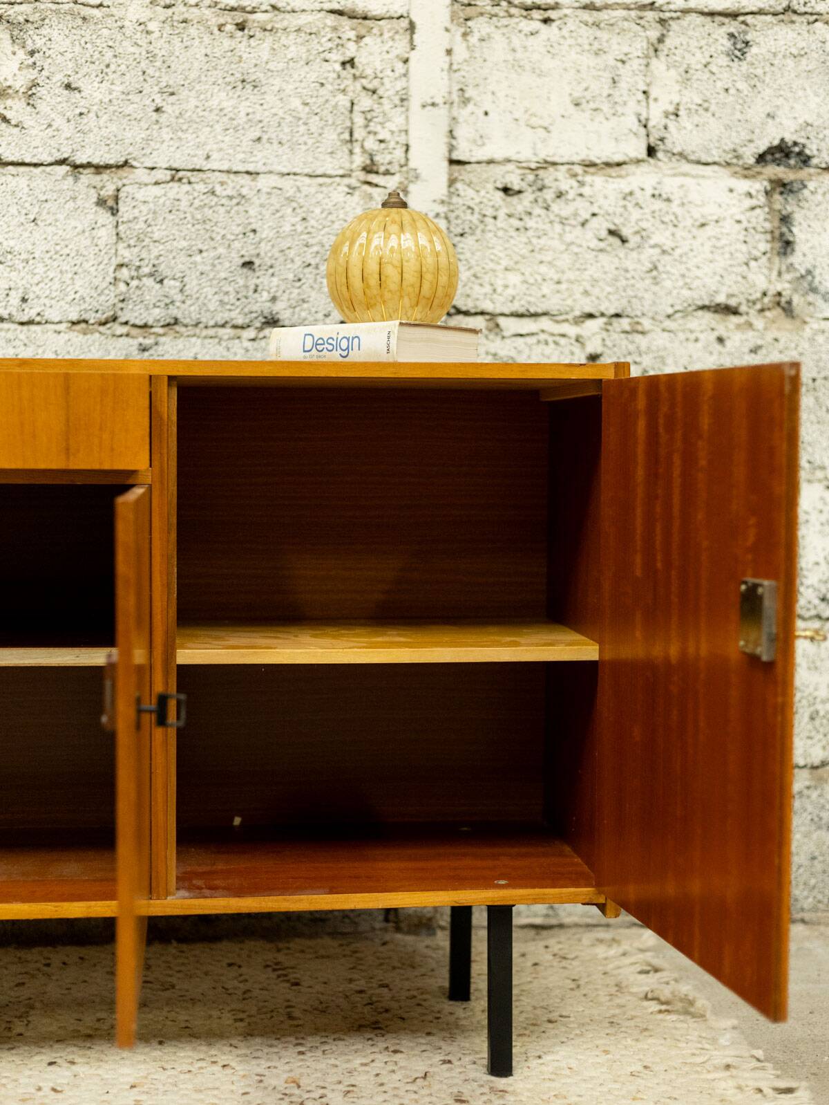 Vintage Scandinavian enfilade with metal legs.