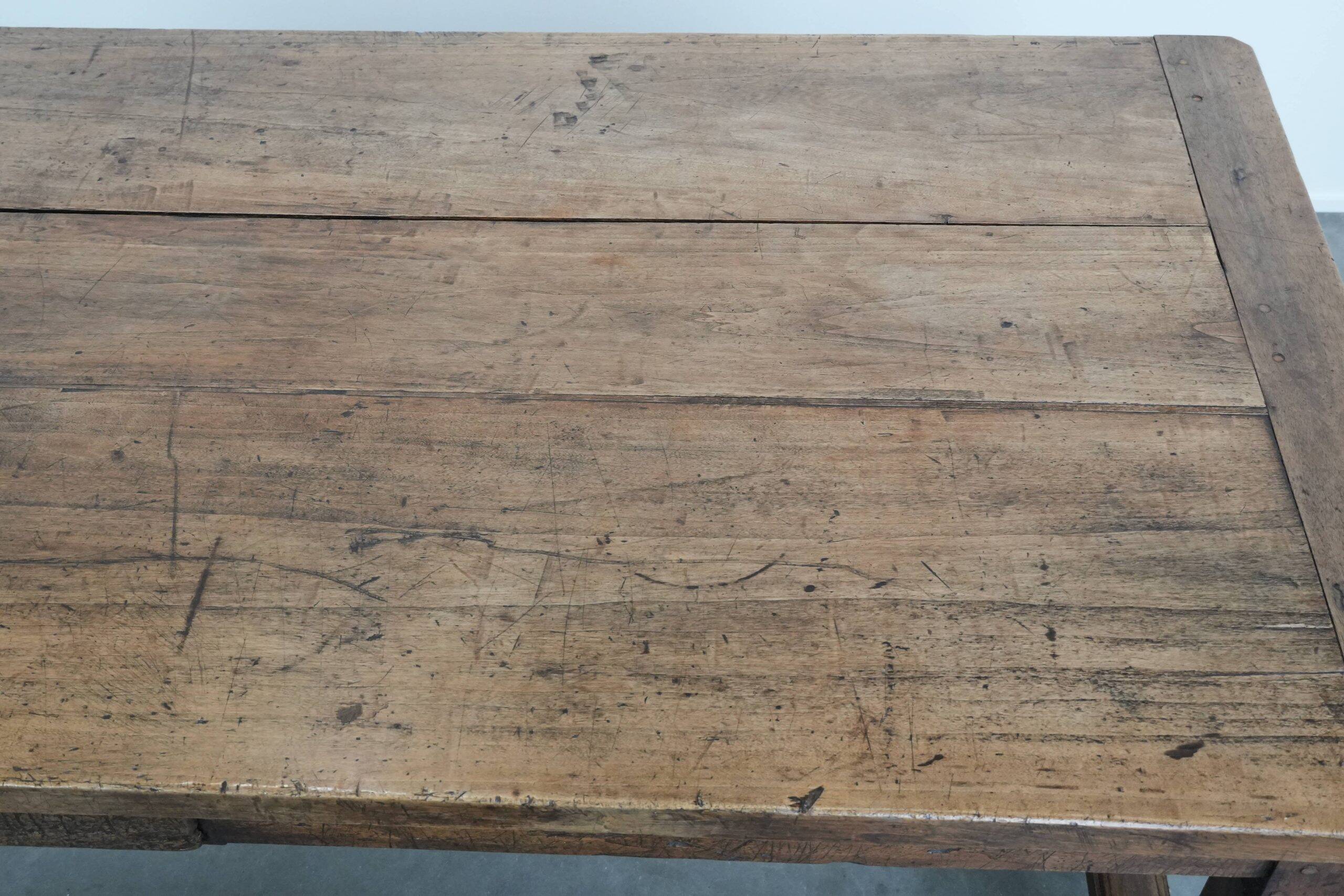 Robust French farmhouse antique dining table from the 18th century