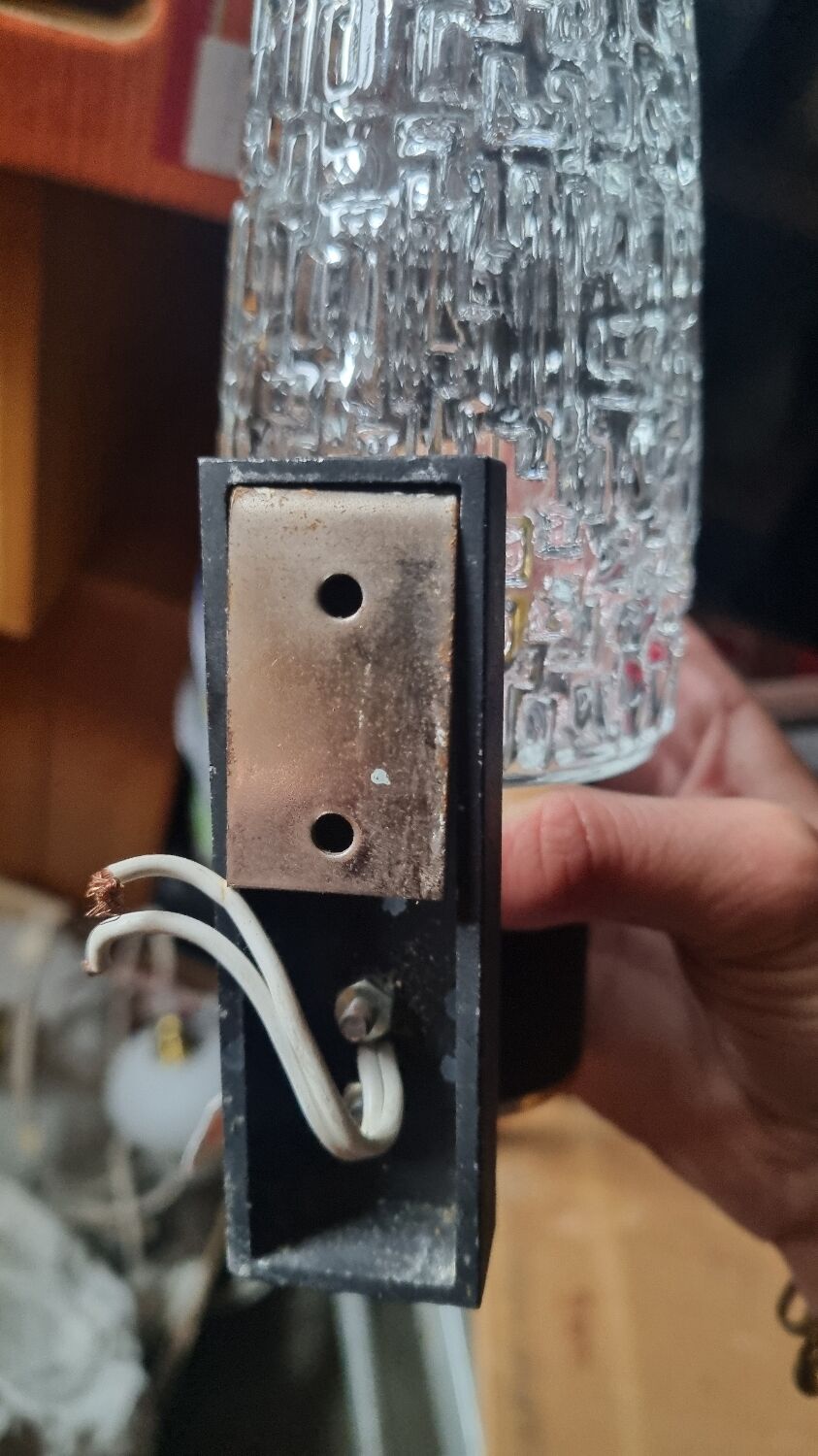 Pair of vintage gold and black wall sconces